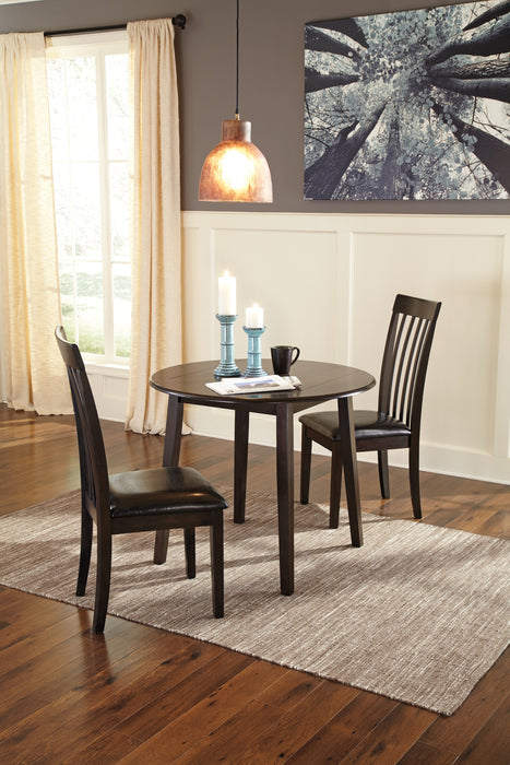 Hammis Round DRM Drop Leaf Table Factory Furniture Mattress & More - Online or In-Store at our Phillipsburg Location Serving Dayton, Eaton, and Greenville. Shop Now.
