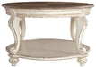 Realyn Oval Cocktail Table Factory Furniture Mattress & More - Online or In-Store at our Phillipsburg Location Serving Dayton, Eaton, and Greenville. Shop Now.