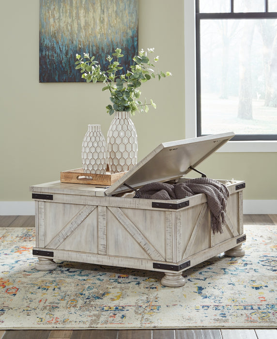 Carynhurst Cocktail Table with Storage Factory Furniture Mattress & More - Online or In-Store at our Phillipsburg Location Serving Dayton, Eaton, and Greenville. Shop Now.