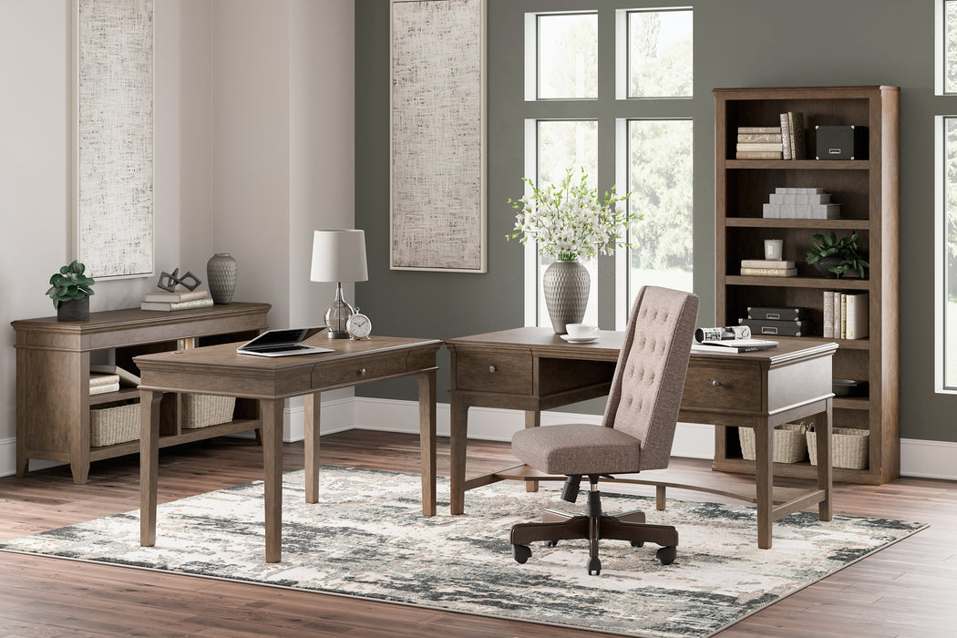 Janismore Home Office Storage Leg Desk Factory Furniture Mattress & More - Online or In-Store at our Phillipsburg Location Serving Dayton, Eaton, and Greenville. Shop Now.