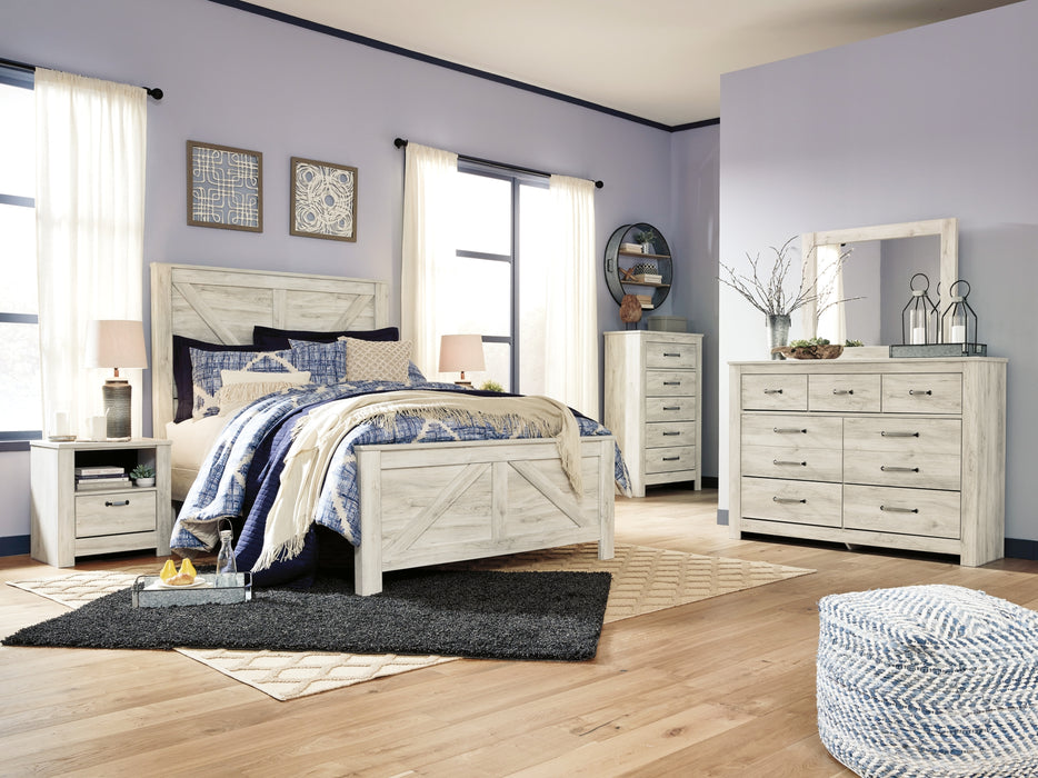 Bellaby Queen Crossbuck Panel Bed with Mirrored Dresser, Chest and Nightstand Factory Furniture Mattress & More - Online or In-Store at our Phillipsburg Location Serving Dayton, Eaton, and Greenville. Shop Now.